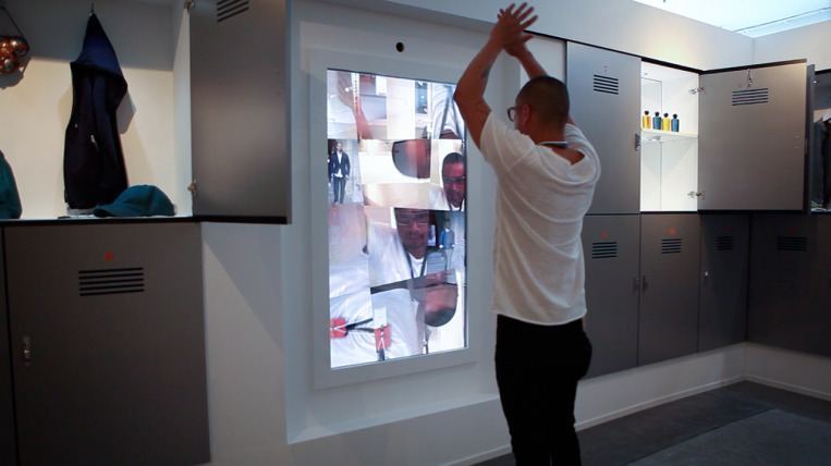 A guest at an interactive mirror in Miami.