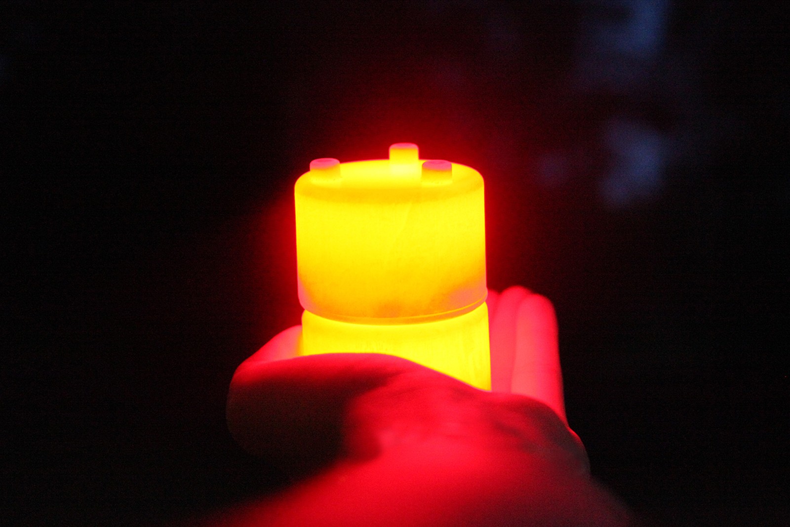 A connected block held in the hand.